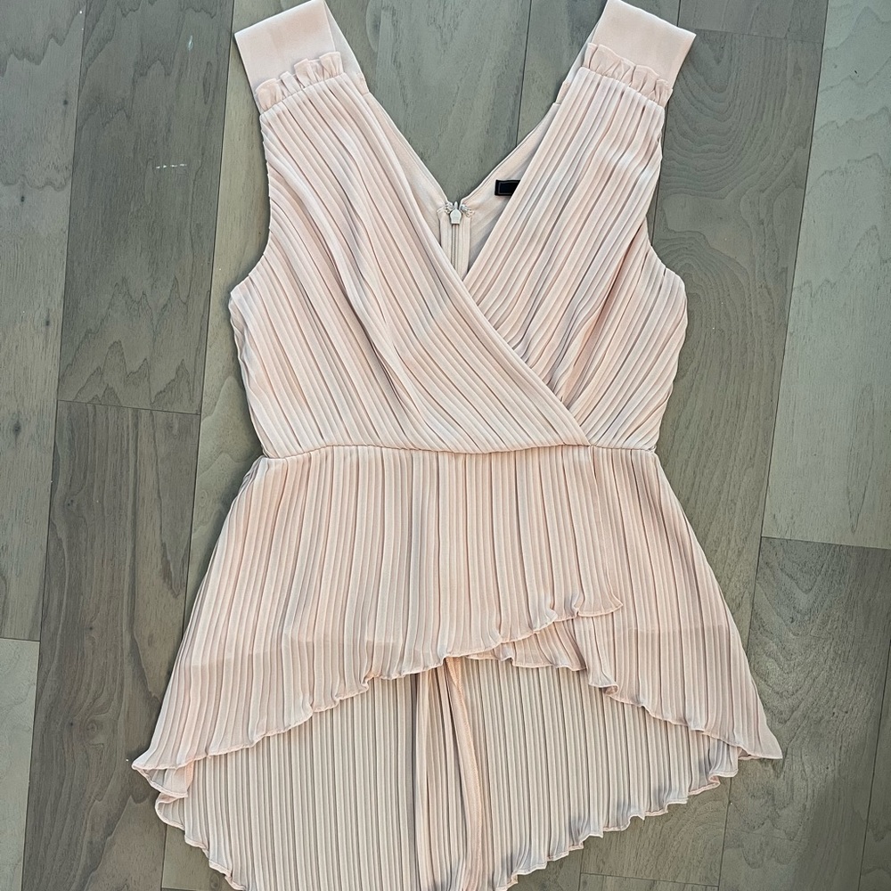 BCBG Maxazria pleated blush top. Brand new.
